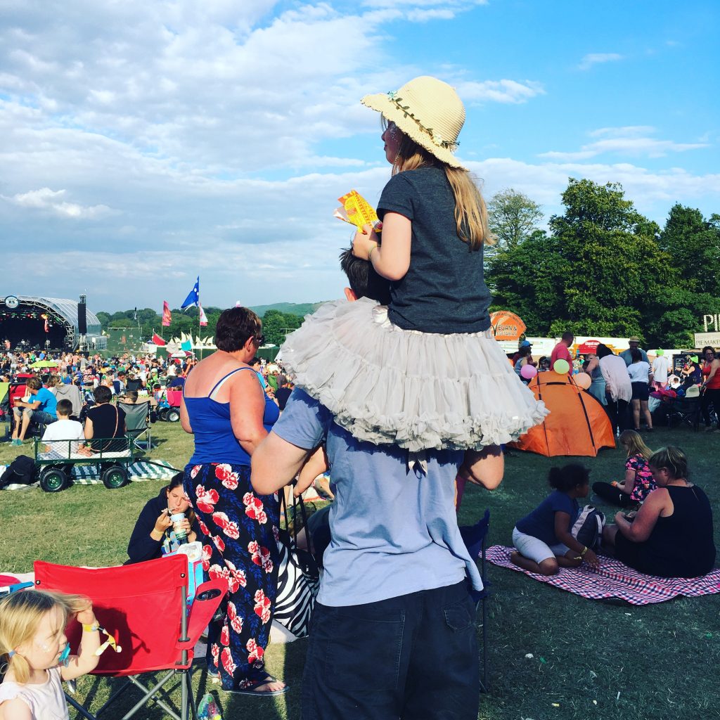 pack fancy dress, suncream, hats and wellingtons when visiting a festival with kids