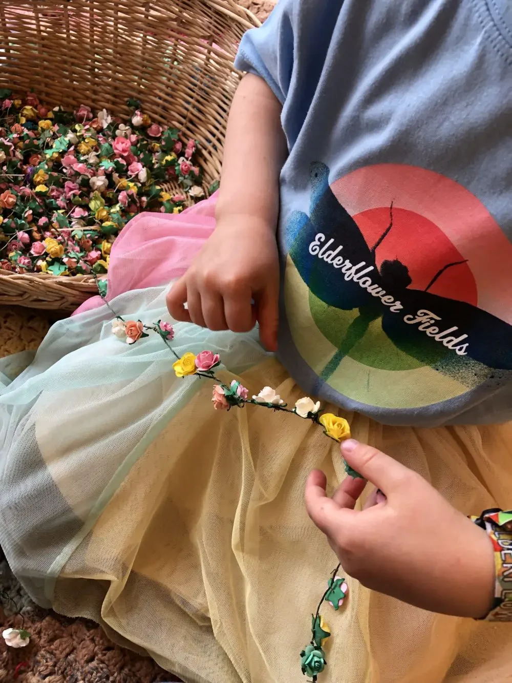 making flower headband garlands at elderflower fields festival 2019